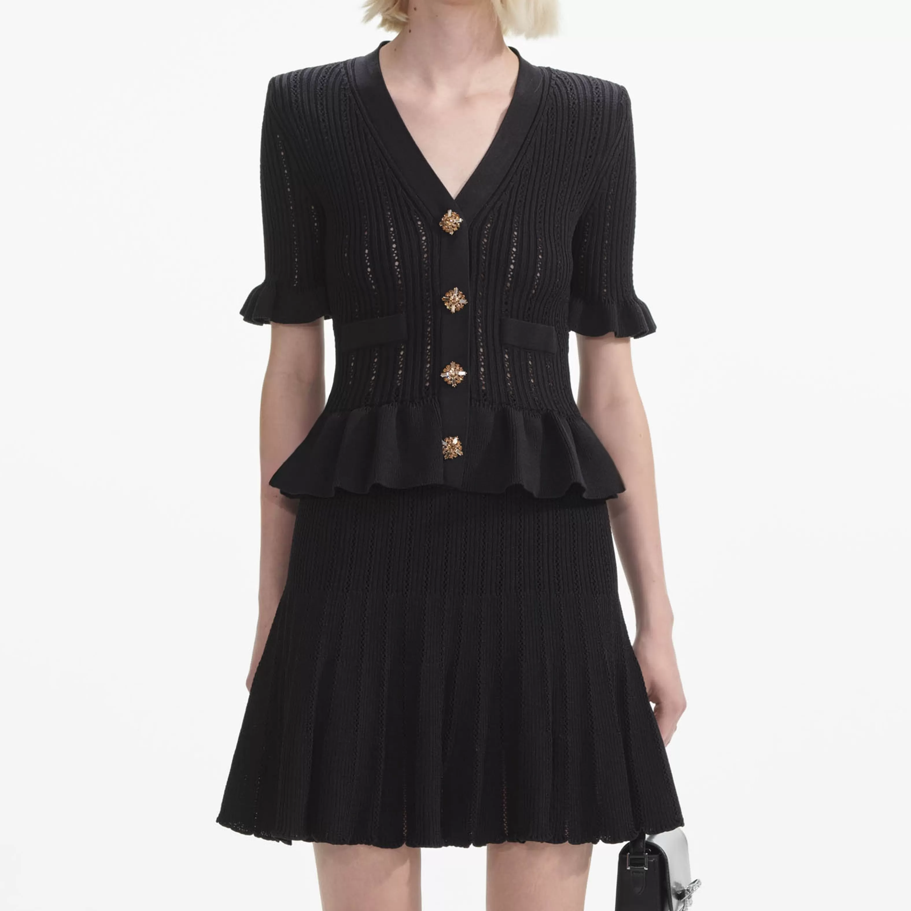 black_knit_peplum_mini_dress_8696.webp Outlet Knit Peplum Mini Dress Dresses | Exclusives