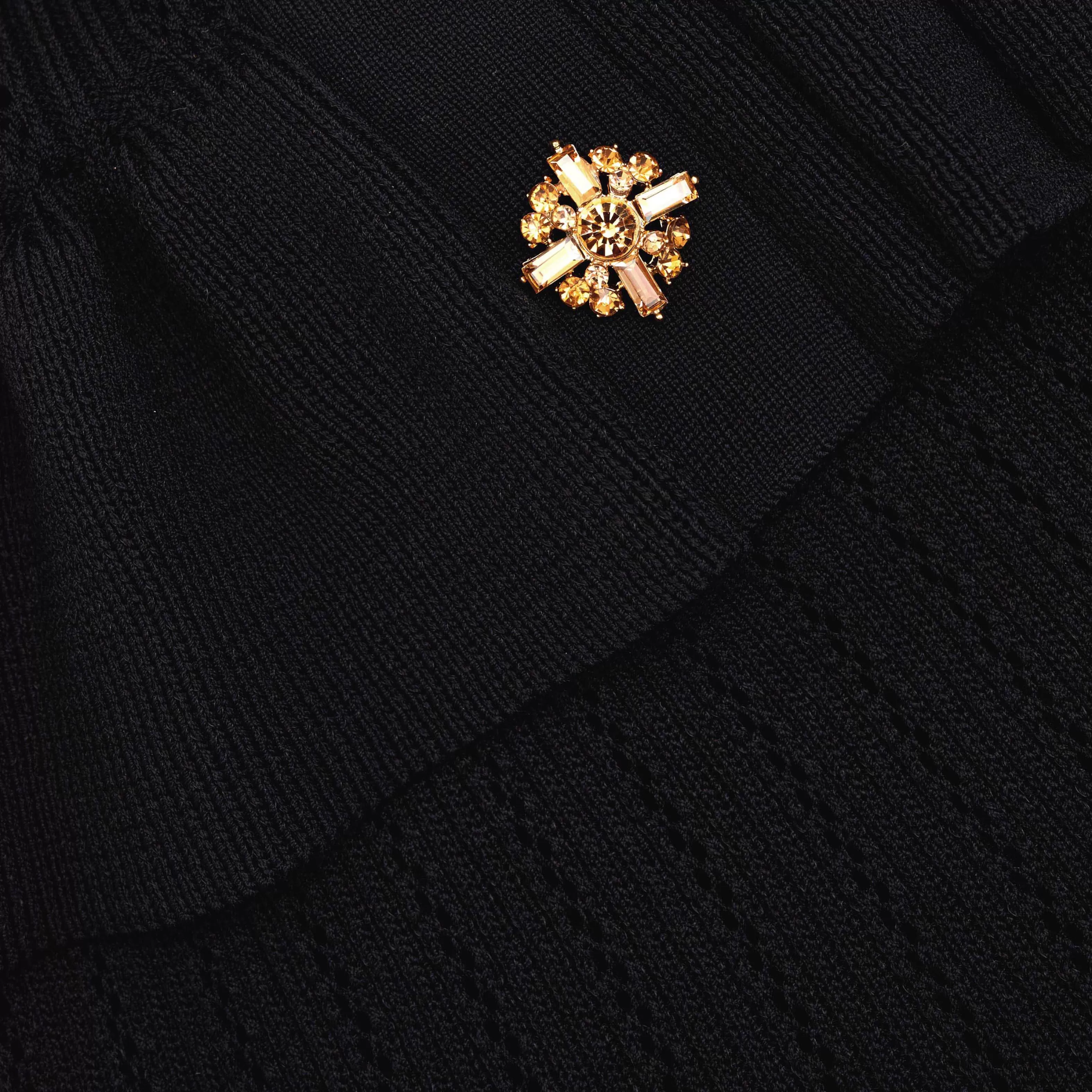 black_knit_peplum_mini_dress_8697.webp Outlet Knit Peplum Mini Dress Dresses | Exclusives