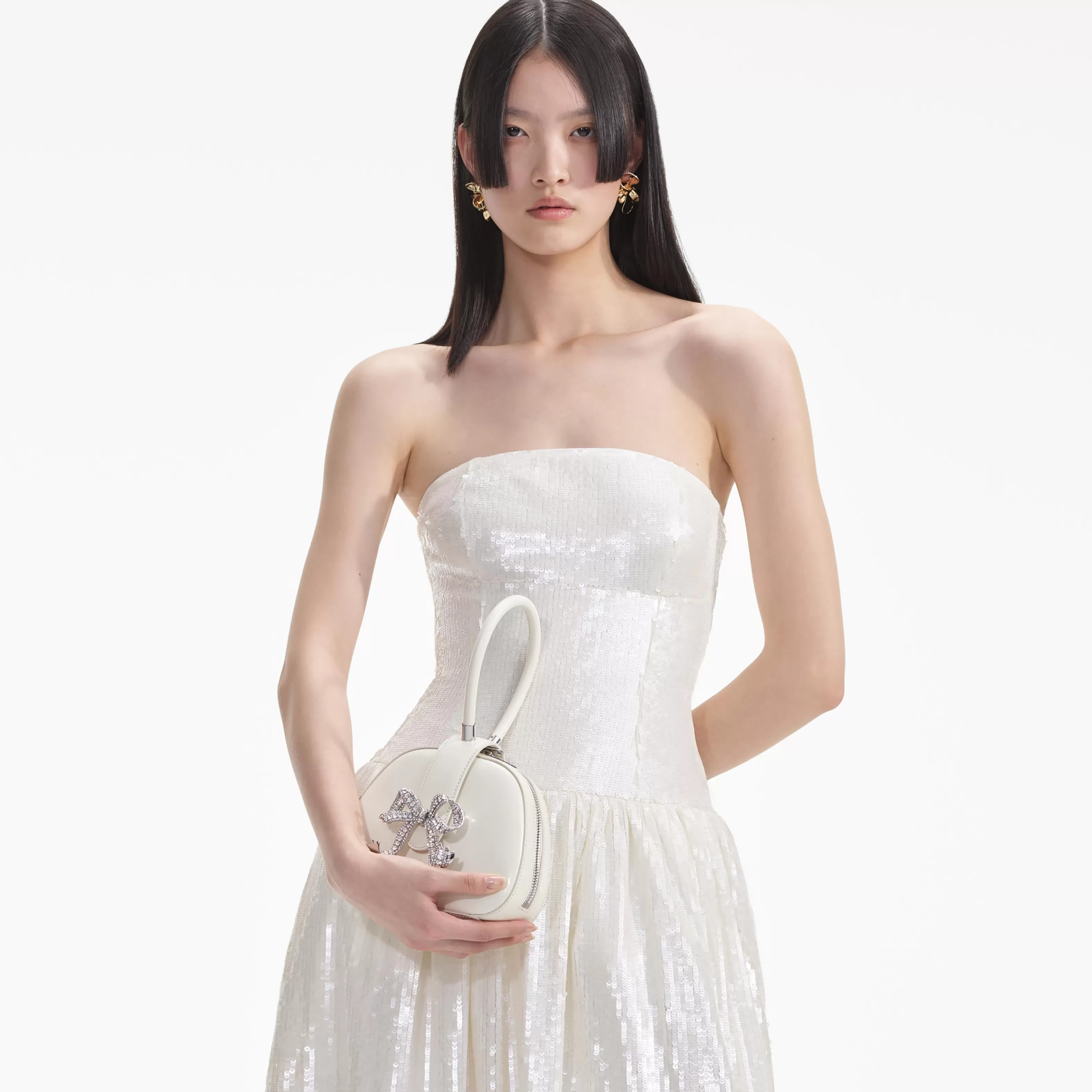 cream_leather_top_handle_mini_bag_11181.webp Shop Leather Top Handle Mini Bag Handbags