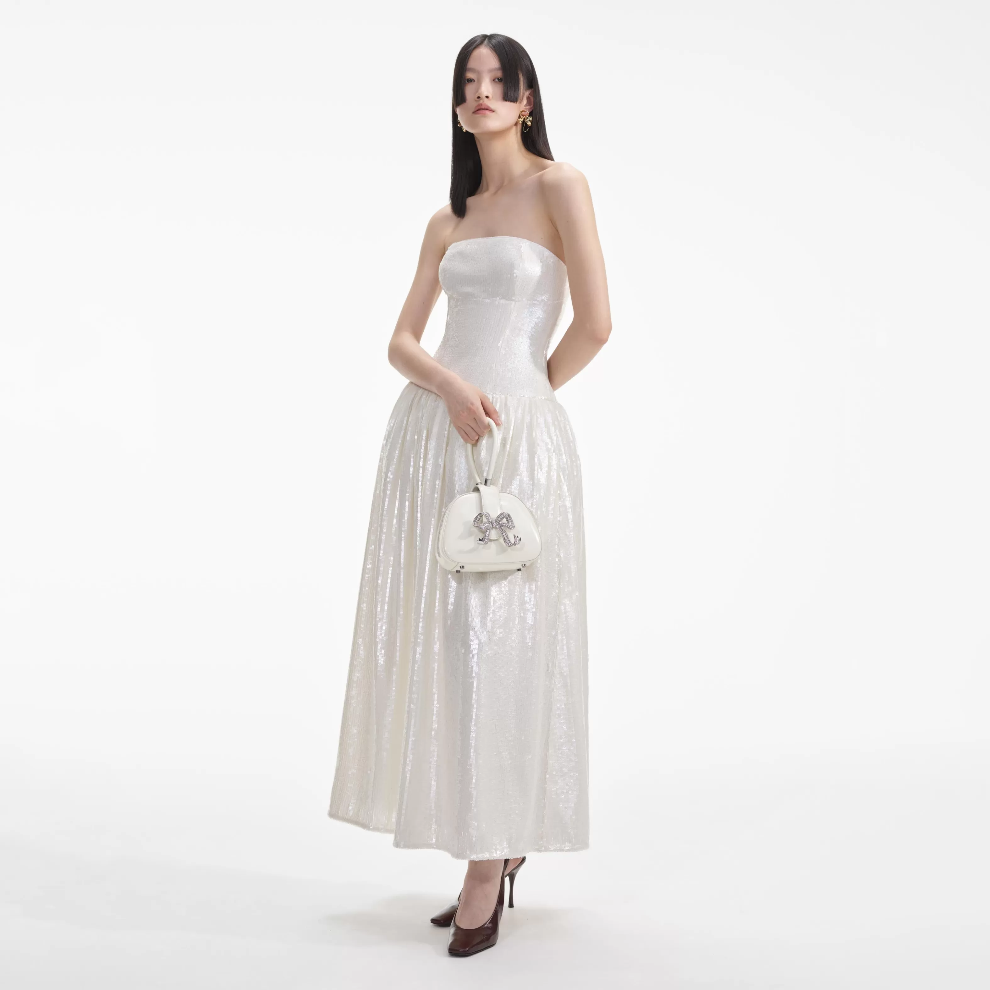 cream_leather_top_handle_mini_bag_11182.webp Shop Leather Top Handle Mini Bag Handbags